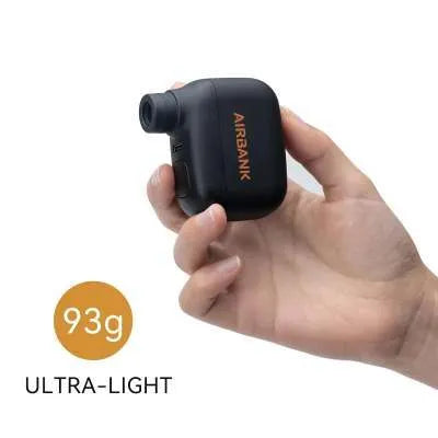 Black AS100 mini electric bicycle tyre pump with USB cable and waterproof storage bag.