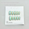 Electroplated Cat's Eye press-on nails in short ladder shapes with XS, S, and M sizes showing Aurora and solid colour designs