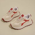 Women's low-top platform sports running shoes in solid colours with flat rubber sole and lace-up front.