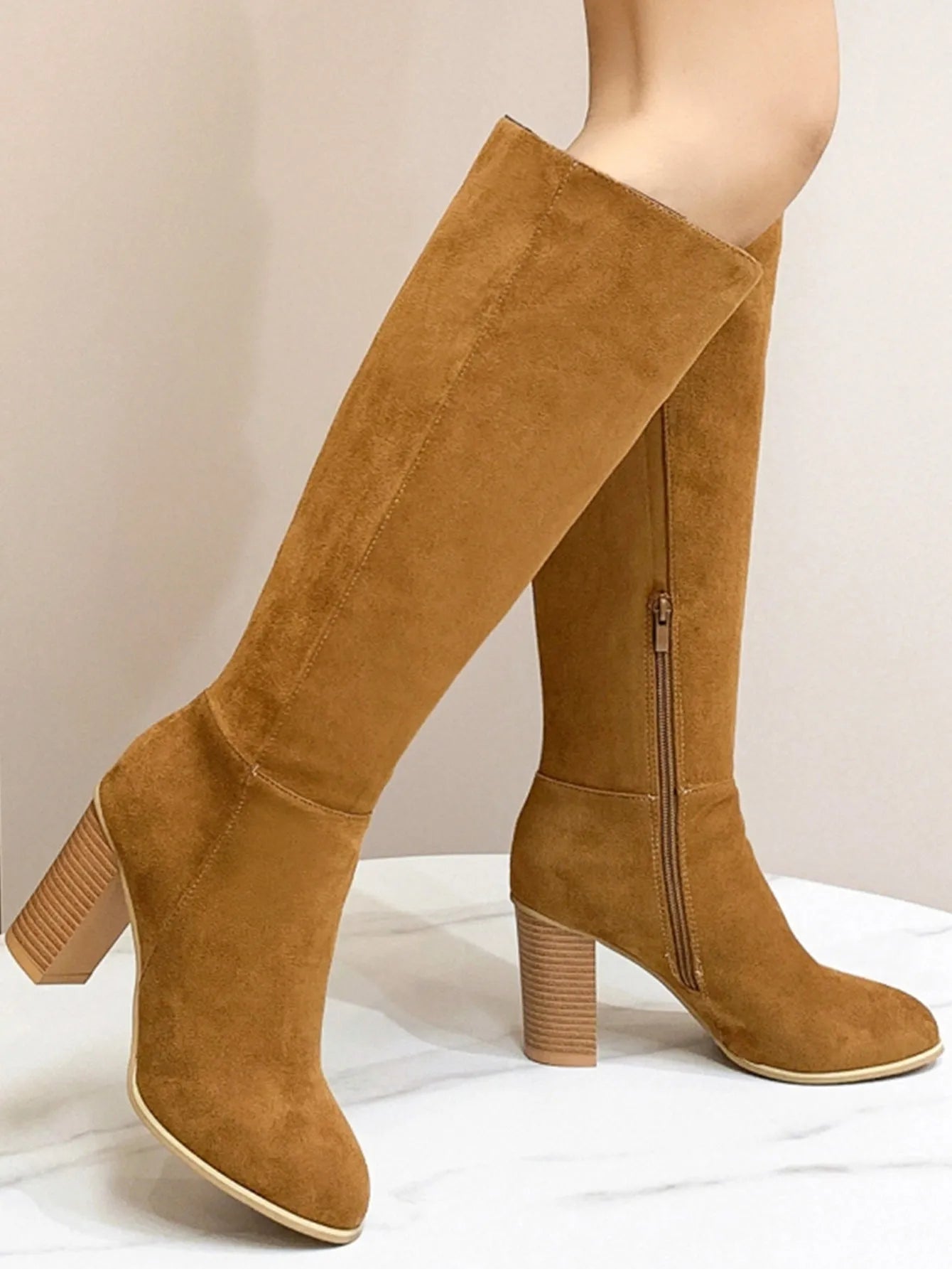 Women's black square toe high heel fashion boots made from PU leather
