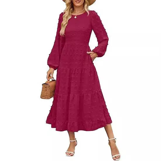 Beige long sleeve casual dress with ruffled sleeves, high waist, and round neck on a hanger.