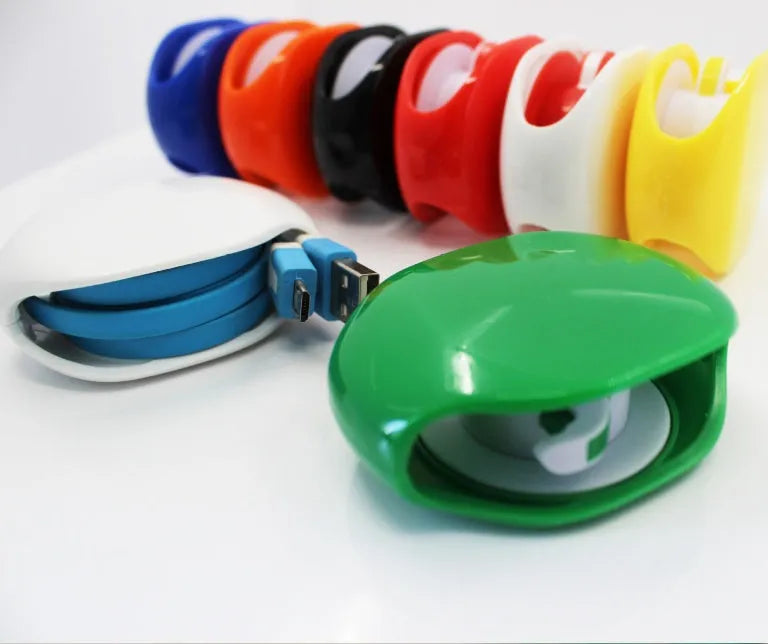 Automatic earphone cable winder retractor in a compact plastic case.