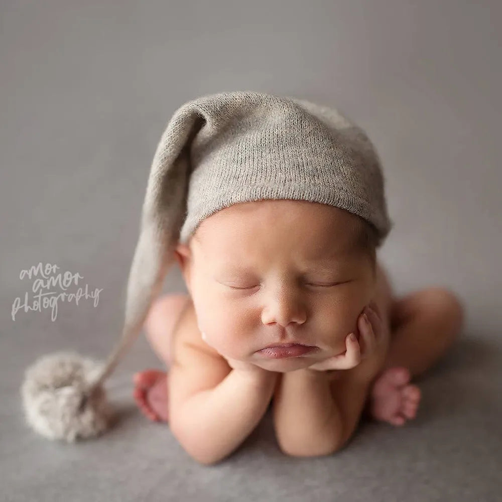 Hand-woven yarn baby photography hat in white with conical crown