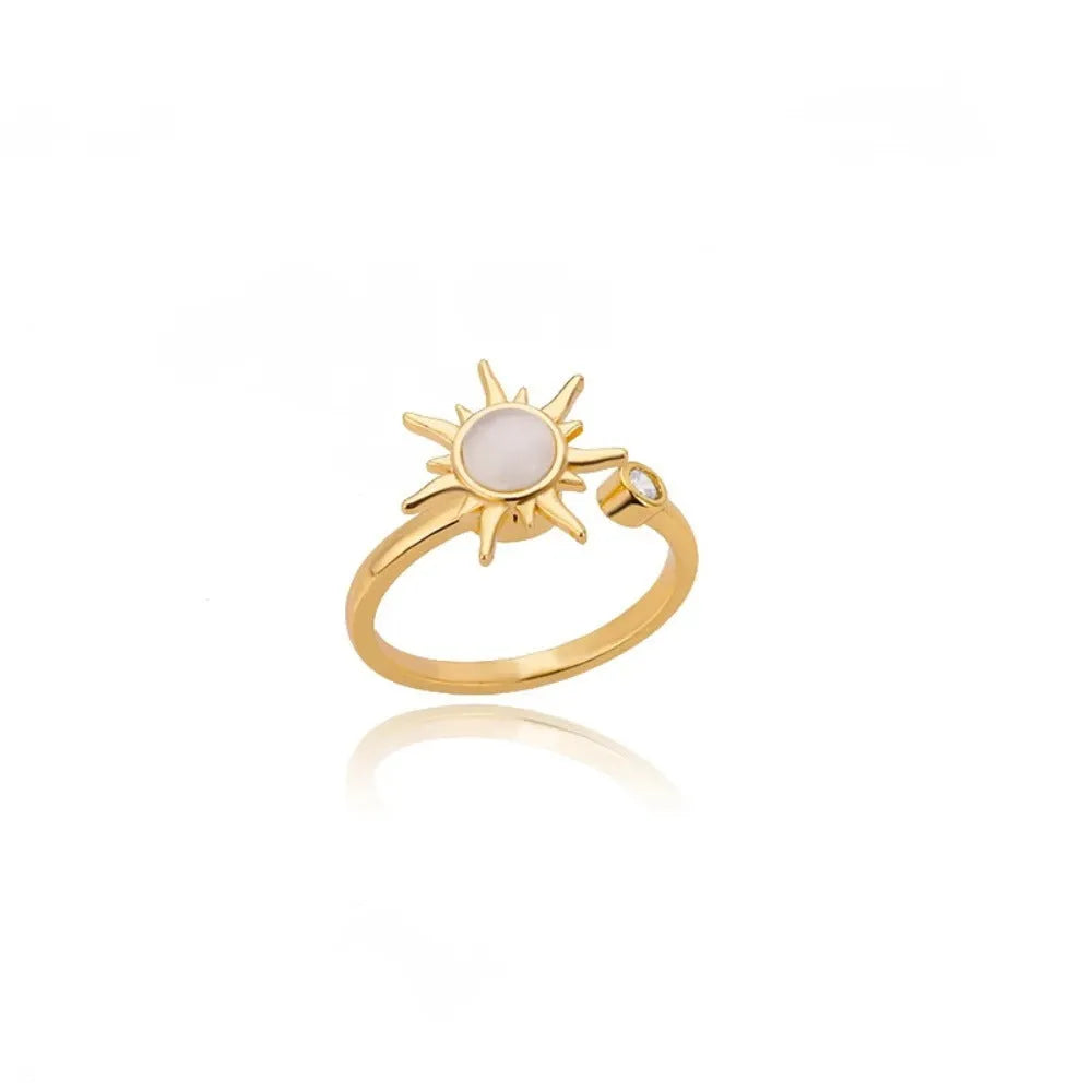 Gold and platinum rotatable decompression ring with adjustable opening and geometric round design