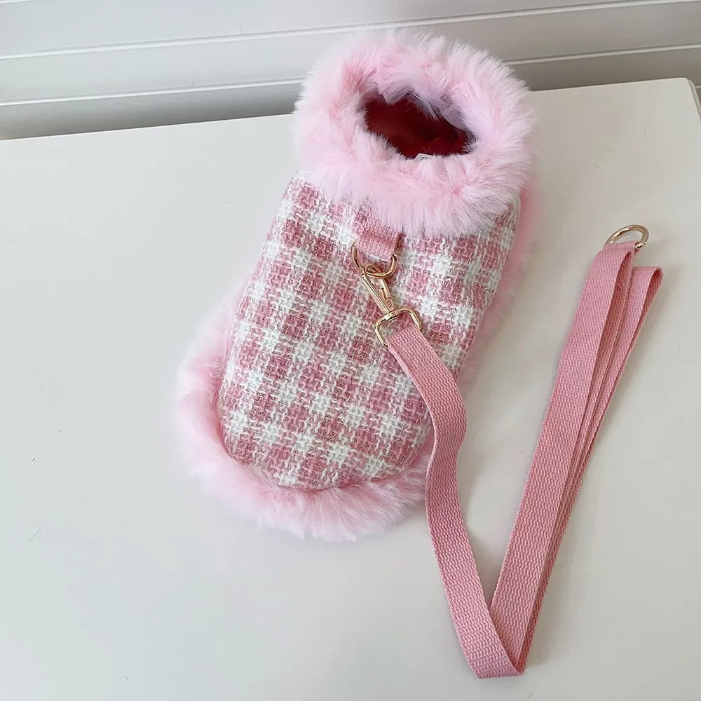 Pink cat costume with cloak and hand holding rope on cat, showing chest and back traction design