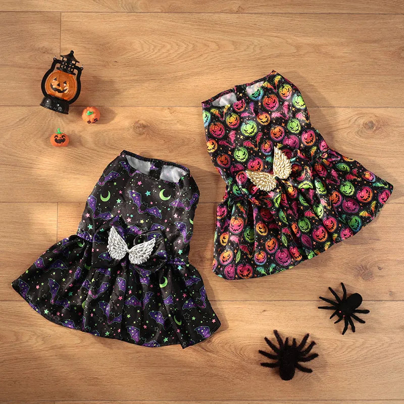 Angel wings Halloween dog costume in bright pumpkin orange and bat pattern colours