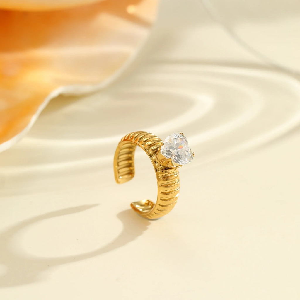 Gold electroplated stainless steel women's ring with geometric heart design and adjustable open mouth