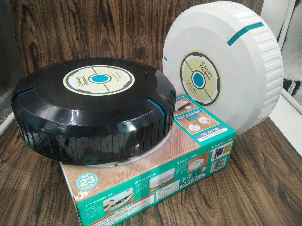 Black or white AC automatic floor sweeping robot on a wooden floor.