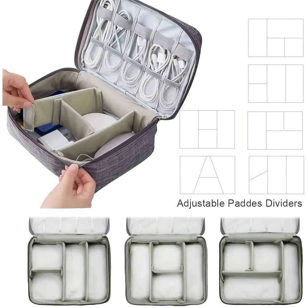 Black waterproof electronics organiser bag open to show mesh pockets, elastic loops and removable padded dividers inside.