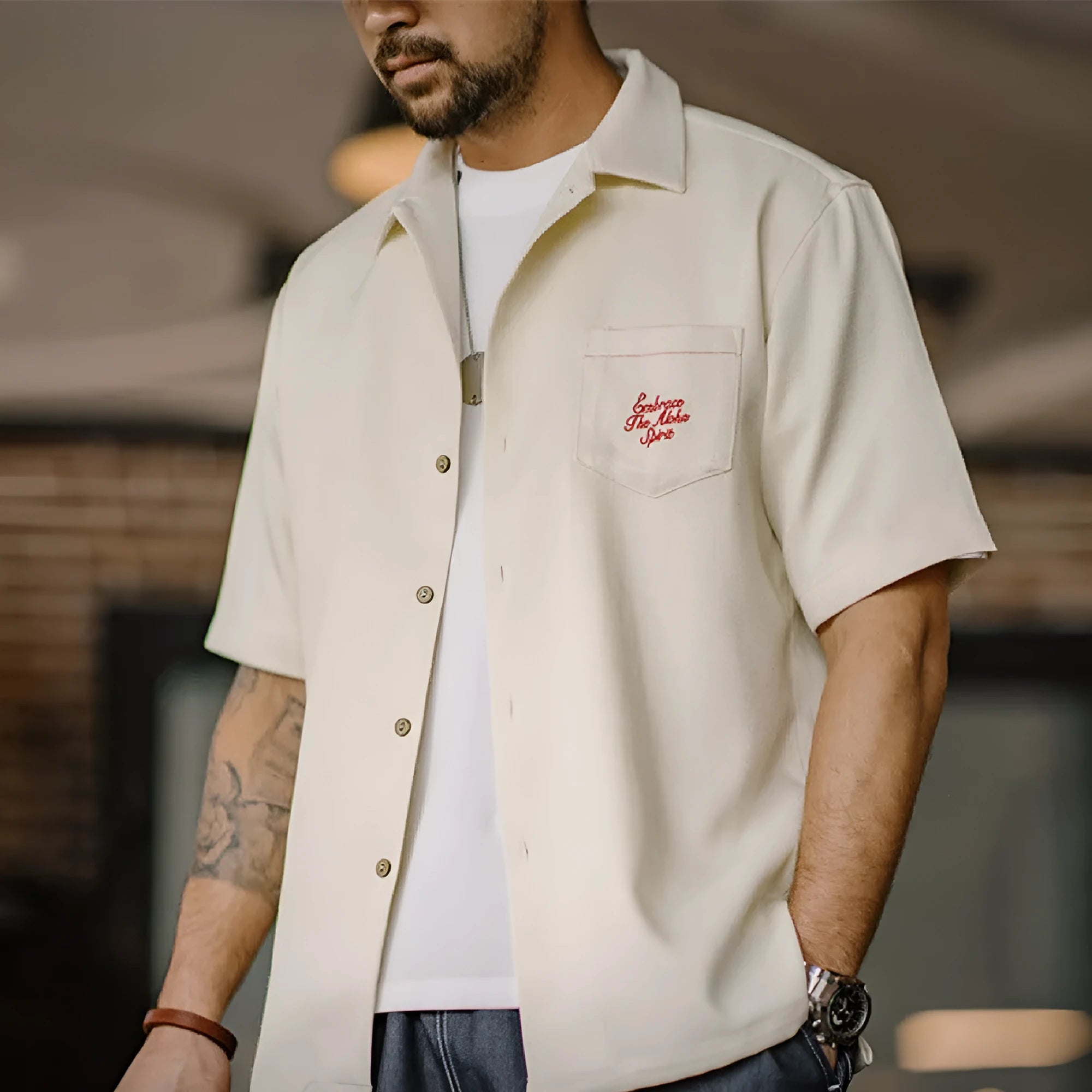 Light apricot men's Cuban collar shirt with bamboo plant pattern design