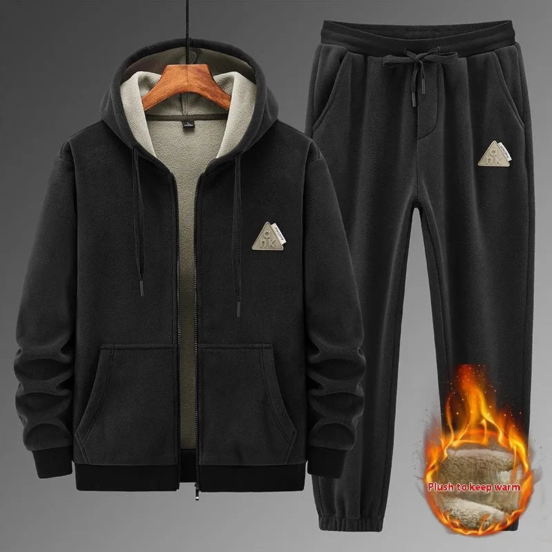 Grey cashmere hooded sweater and cotton pants casual sports suit set laid flat.