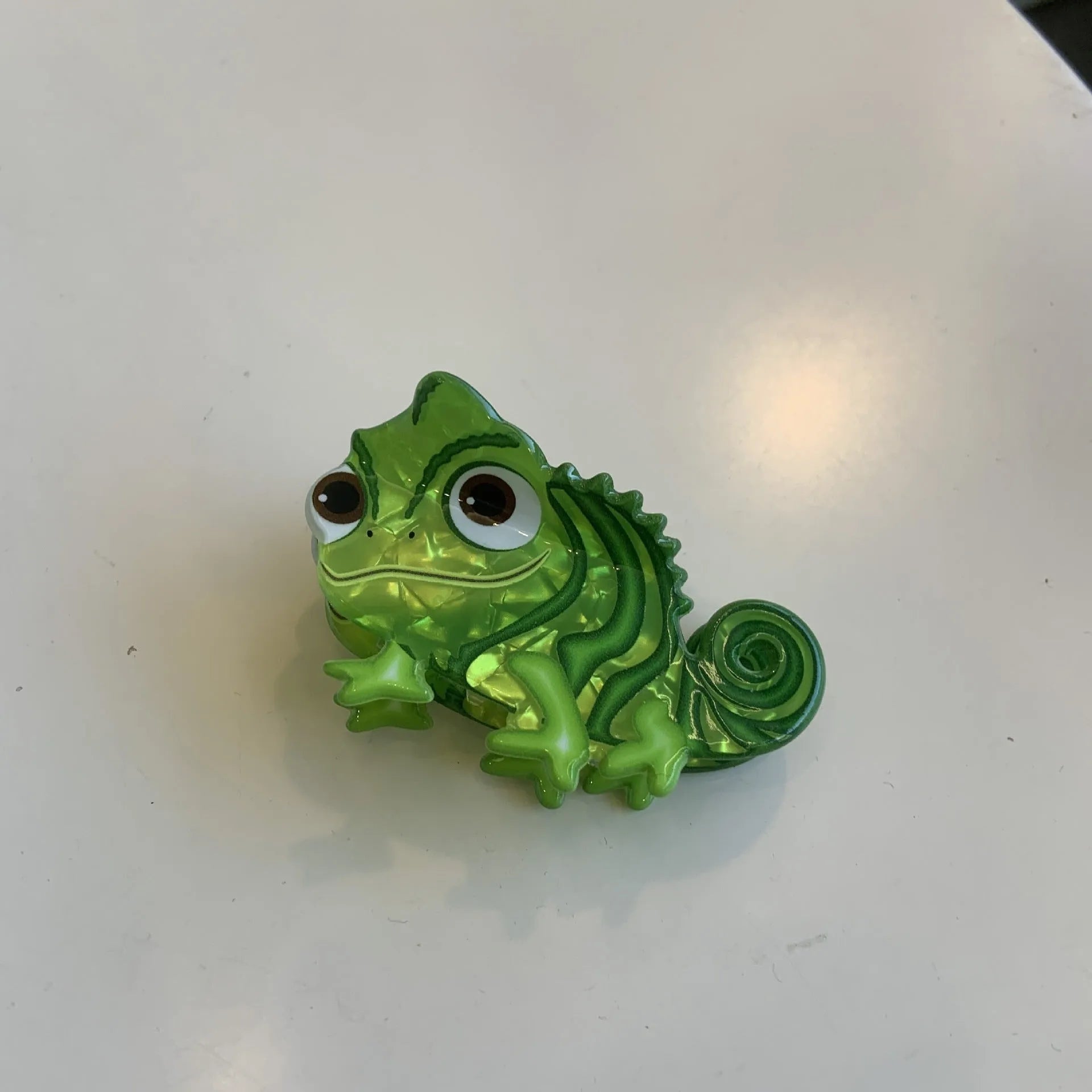 Acrylic dinosaur hair clip with jaw grip closure in one of six colourful designs