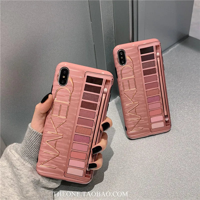 Flesh and grey silicone phone case for multiple iPhone models on a table.
