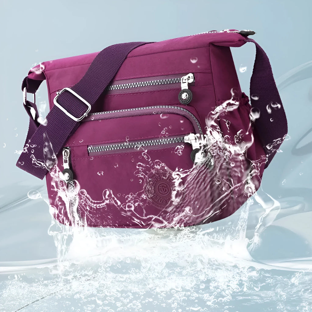 Nylon soft shoulder messenger bag in square vertical shape with single strap.