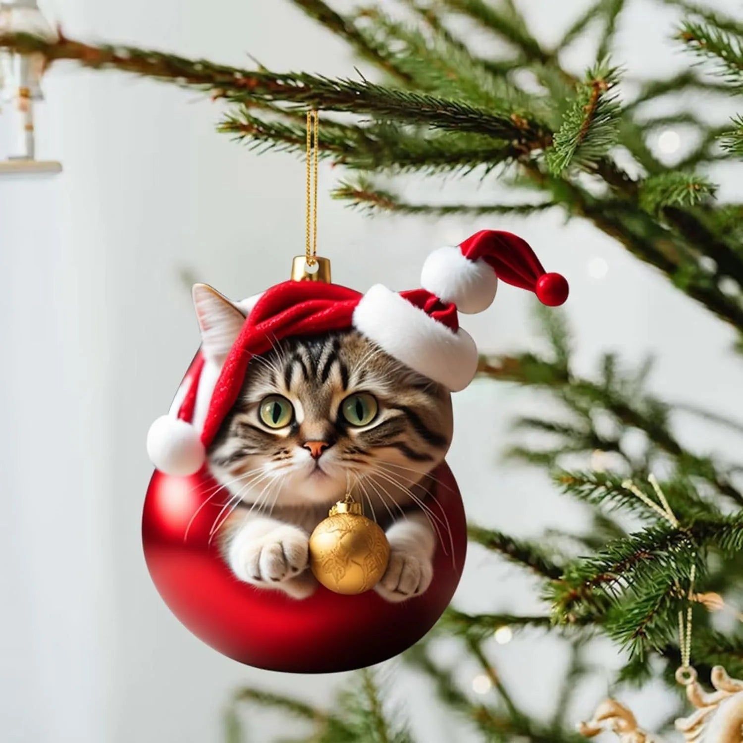 Cartoon style creative kitty Christmas ornament hanging in a car, made from clear acrylic.