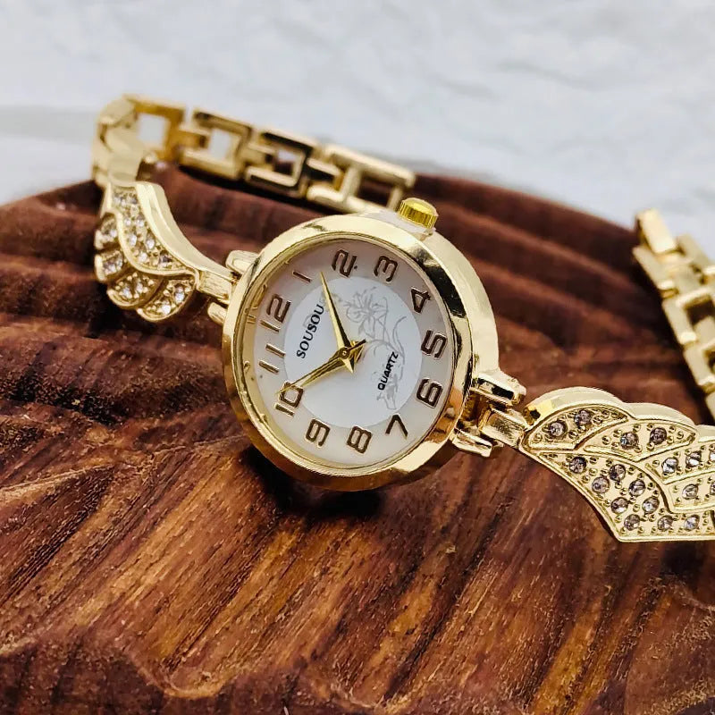 Women's stainless steel watch with round dial in gold, gold white, or black golden surface options