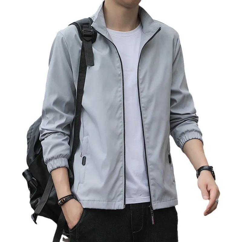 Men's Korean style loose lapel casual jacket in a lightweight fabric, shown in blue.