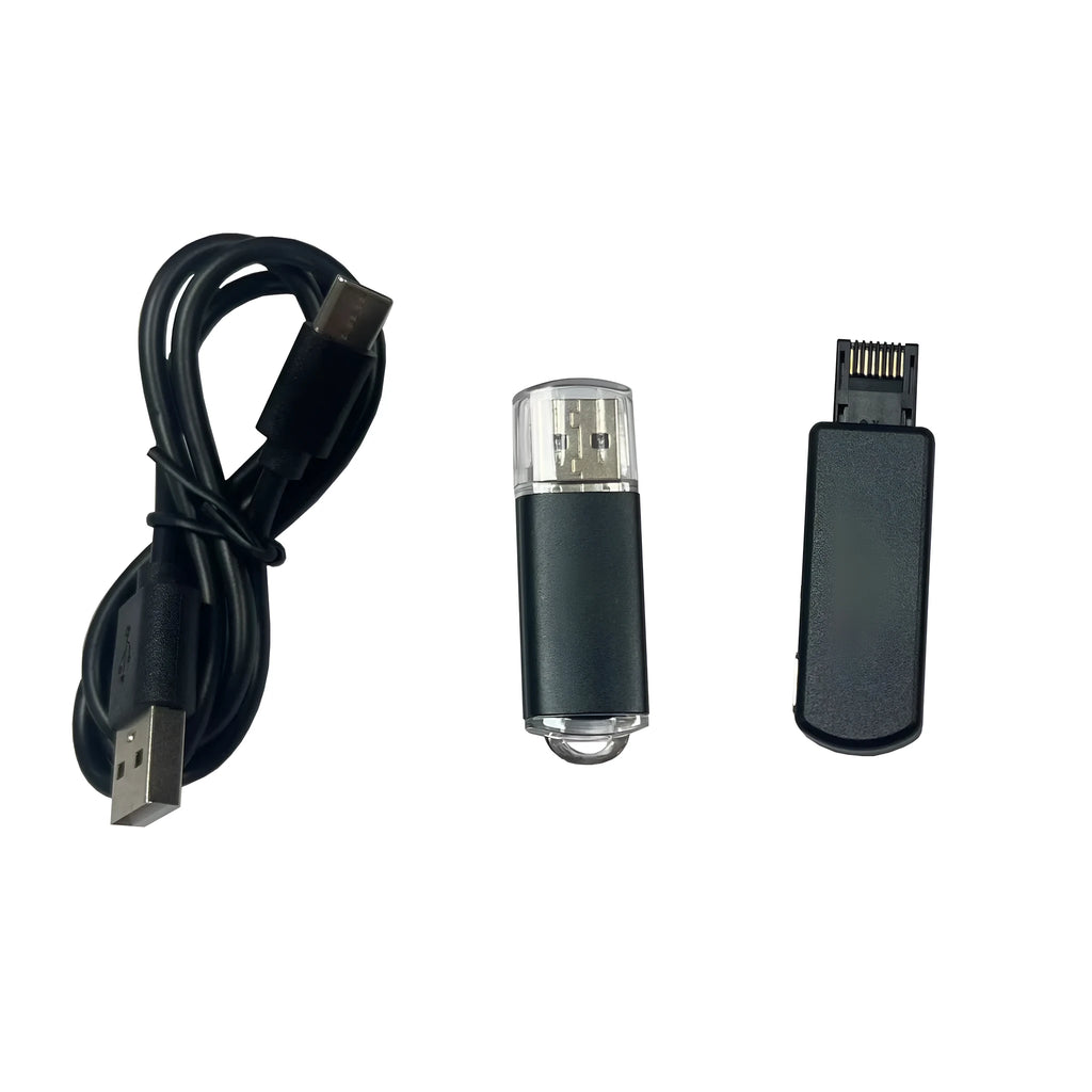 Black aluminum alloy JB Tool USB adapter for console firmware switching with Ethernet port.