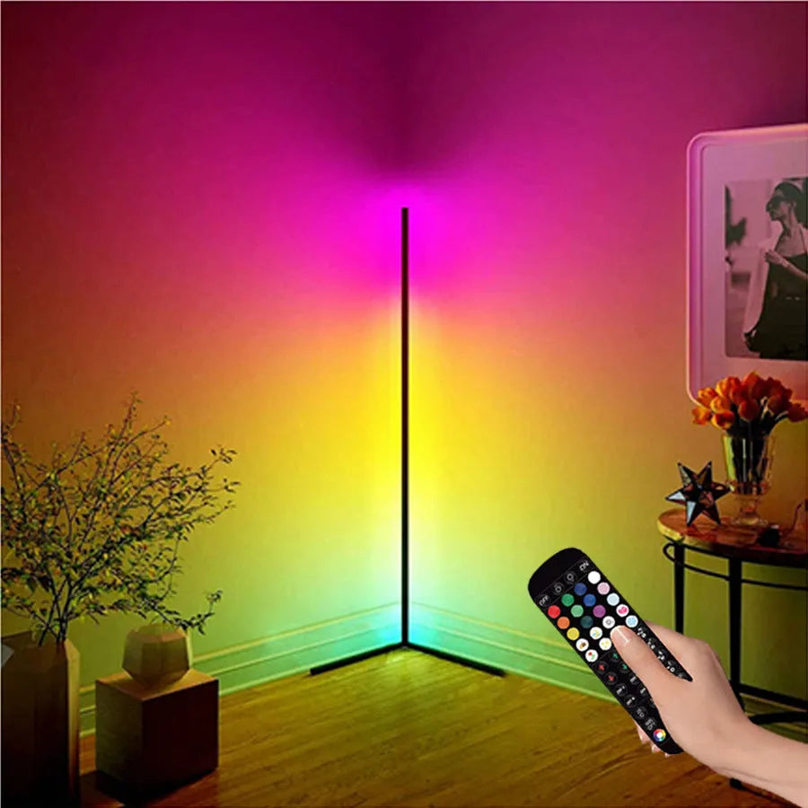 Black aluminium smart RGB floor lamp with silicone shade and remote control on wooden floor