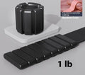 Velcro silicone strap-on weight bracelet in black, shown on an ankle, with 1lb and 2lb weight options.