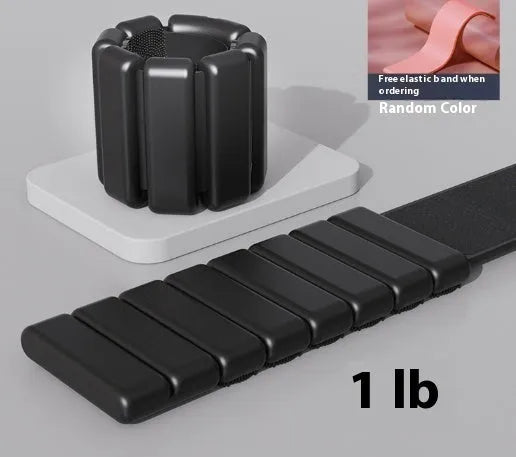 Velcro silicone strap-on weight bracelet in black, shown on an ankle, with 1lb and 2lb weight options.