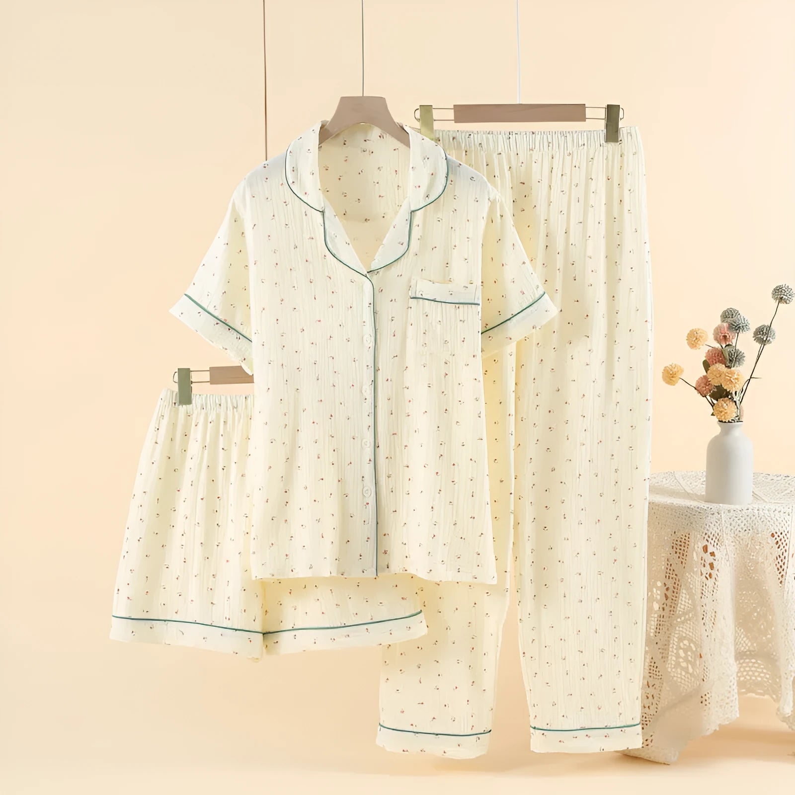 Garden Gold cotton three-piece pajama set with lapel collar and trousers on young woman