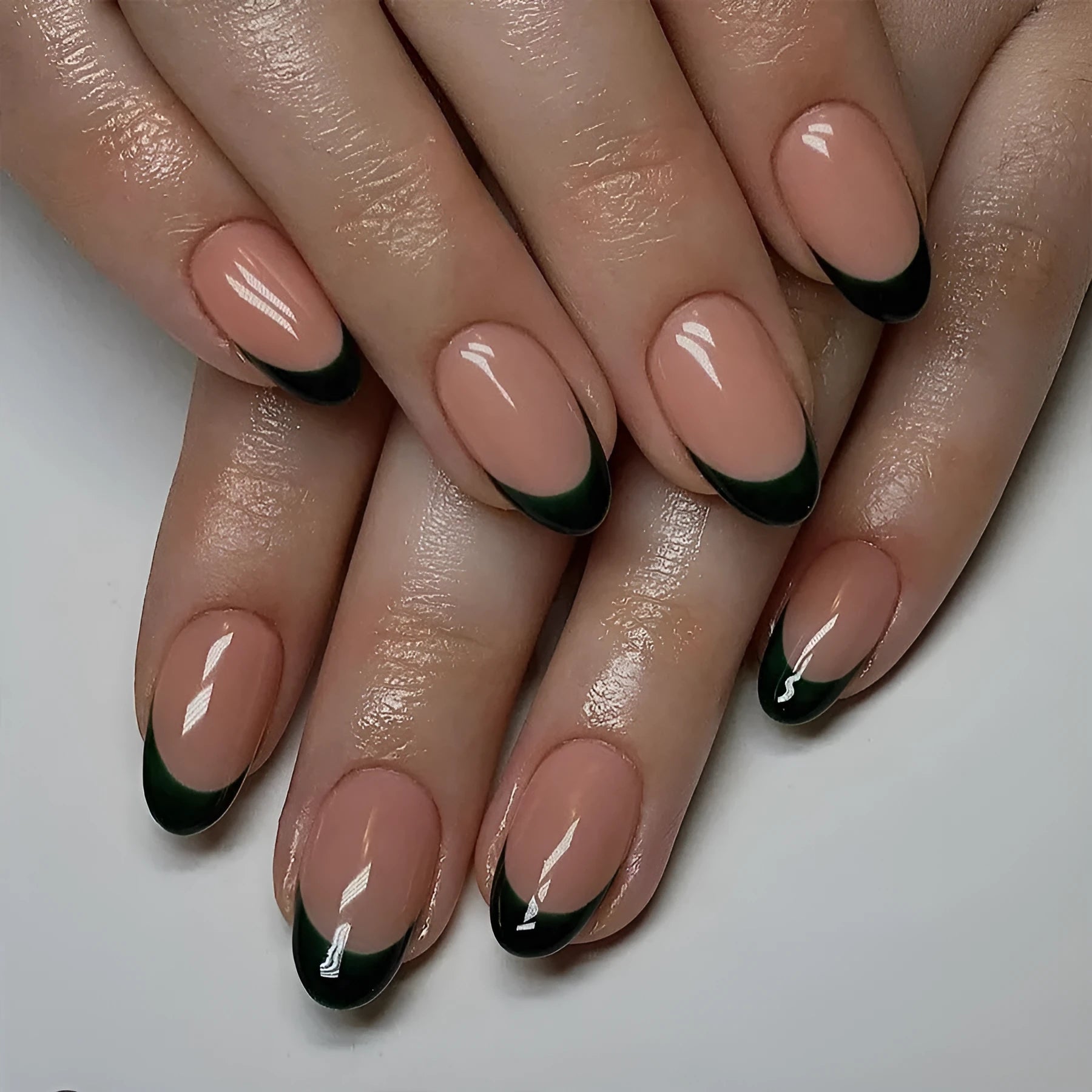 Set of 24 black French manicure false nails in a short almond shape, style J049.