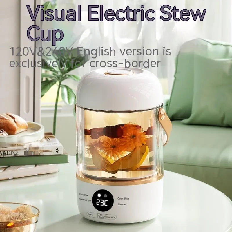 Smart portable electric stew cooker with transparent glass lid showing food inside, on a kitchen counter.