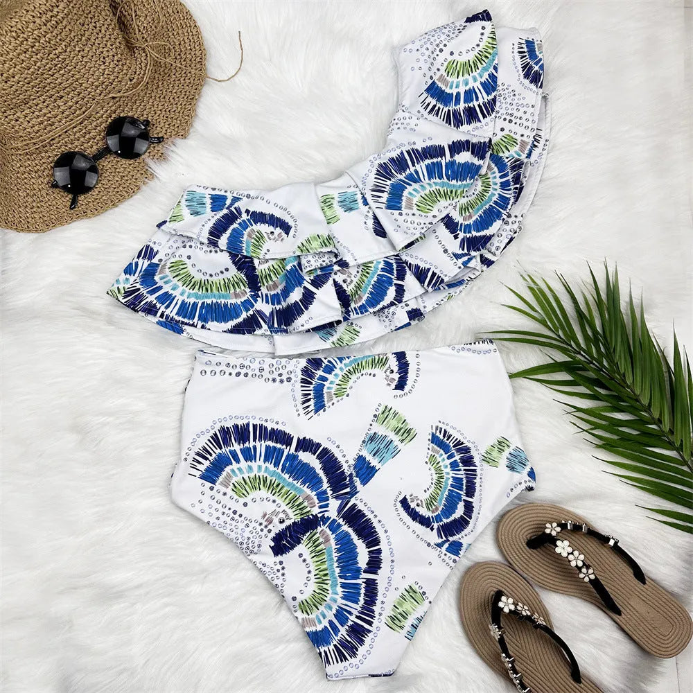 White one-shoulder women's swimsuit with lotus leaf decoration and high-leg split
