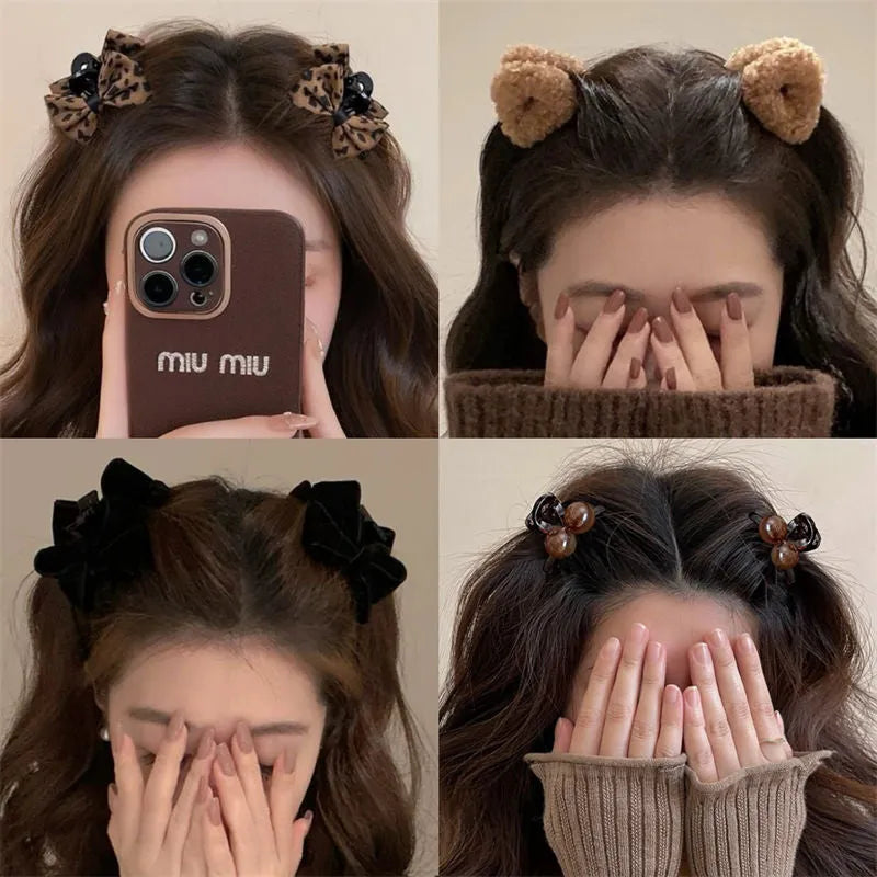 Pair of leopard bow plastic hair barrettes with Seiko finish in brown leopard pattern