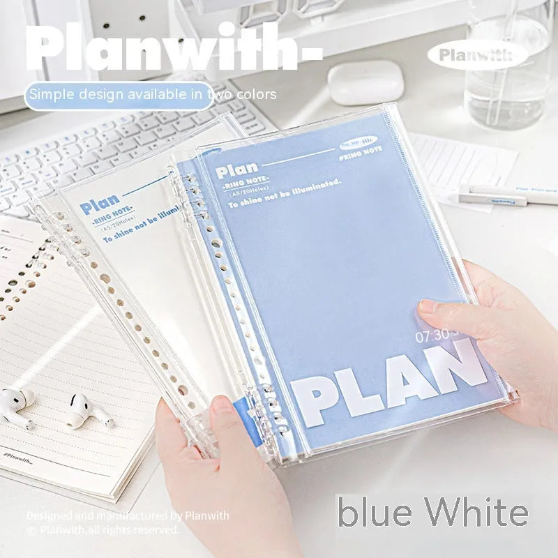 A5 spiral notebook with transparent PVC cover in blue, showing loose pages inside, next to a white version.