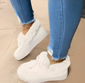White cotton casual shoes with a round toe, non-slip rubber sole, and a visible velvet lining for warmth.
