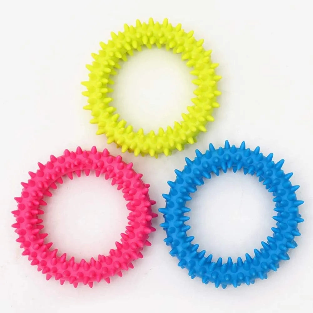 Blue spiky circle ring dog chew toy made of TPR on a white background.