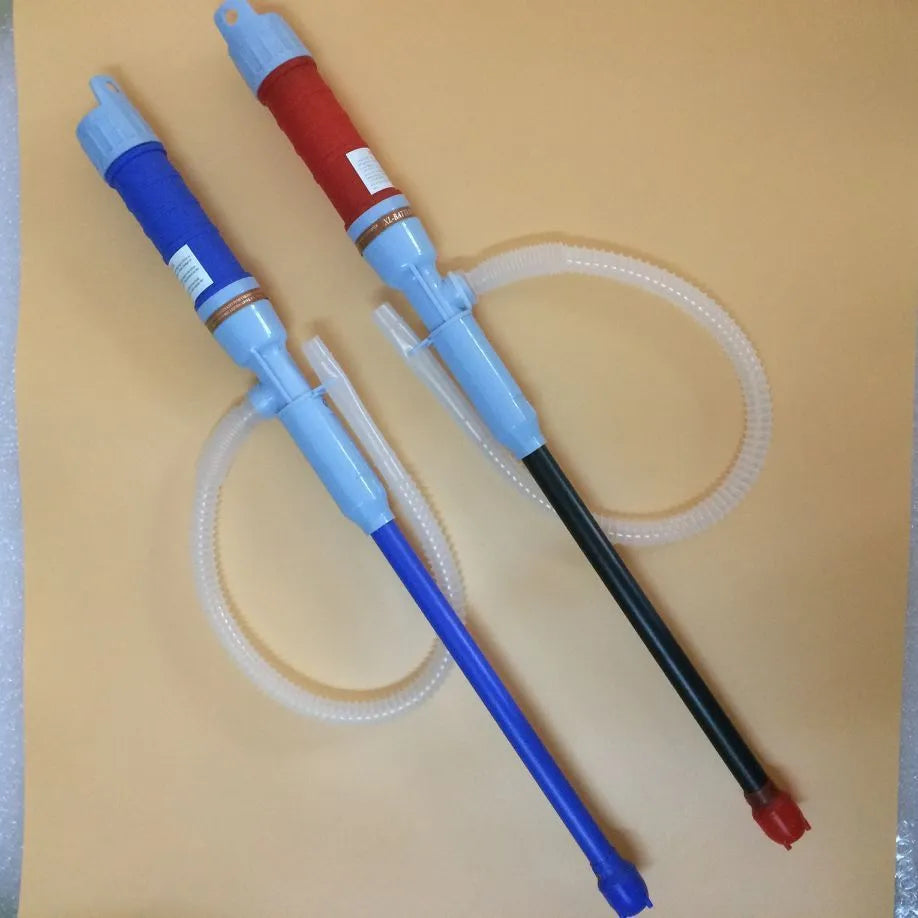 Blue and red manual hand siphon pump for transferring fuel, oil and water