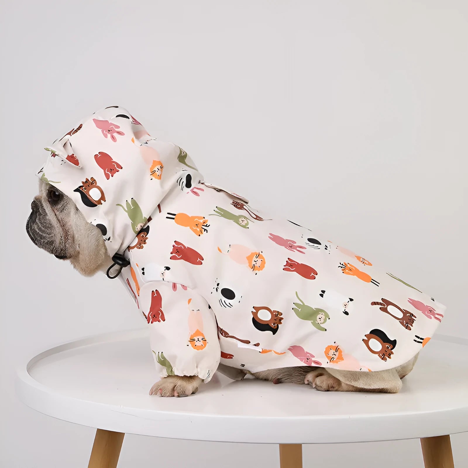 Beige cartoon dog raincoat with double waterproof coating in multiple sizes