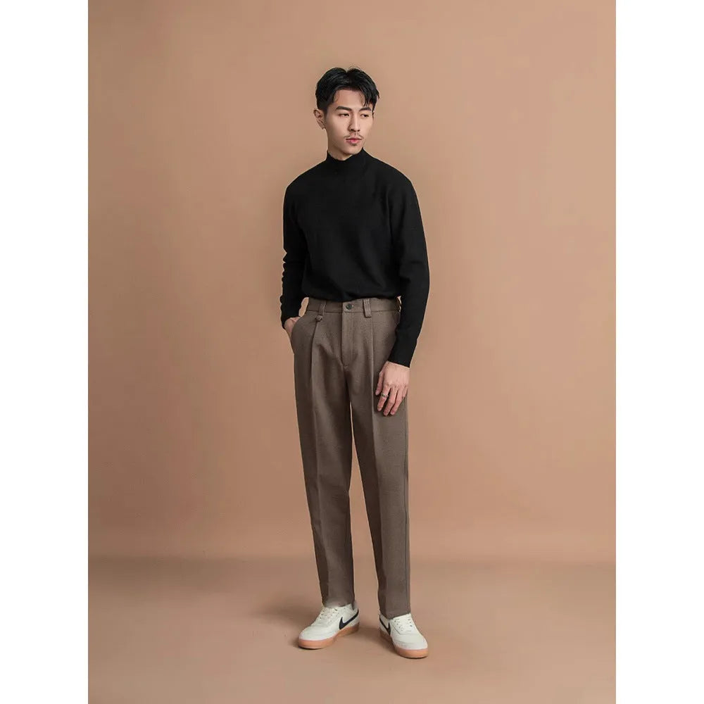 Men's straight-fit polyester trousers in dark grey, laid flat showing waistband and leg cut.