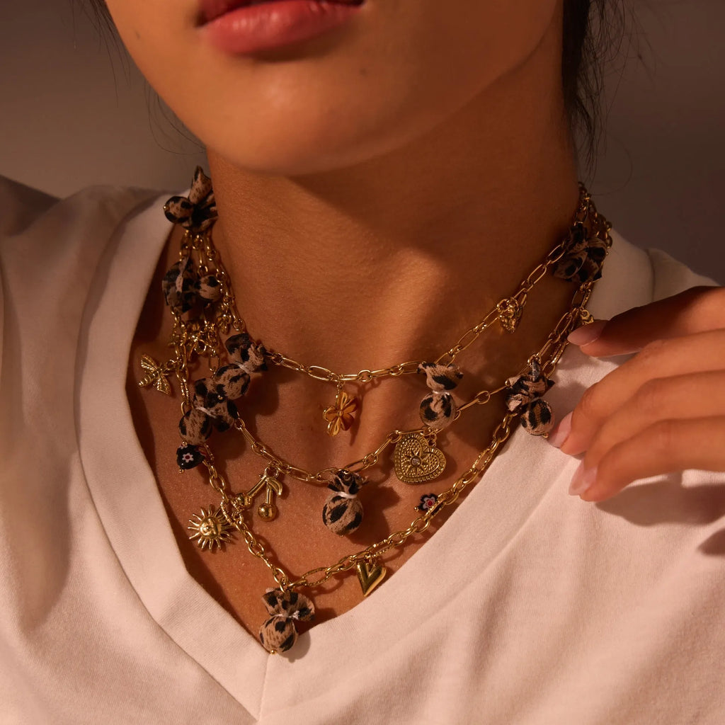 Geometric leopard pendant necklace with love hearts and flowers on adjustable stainless steel chain