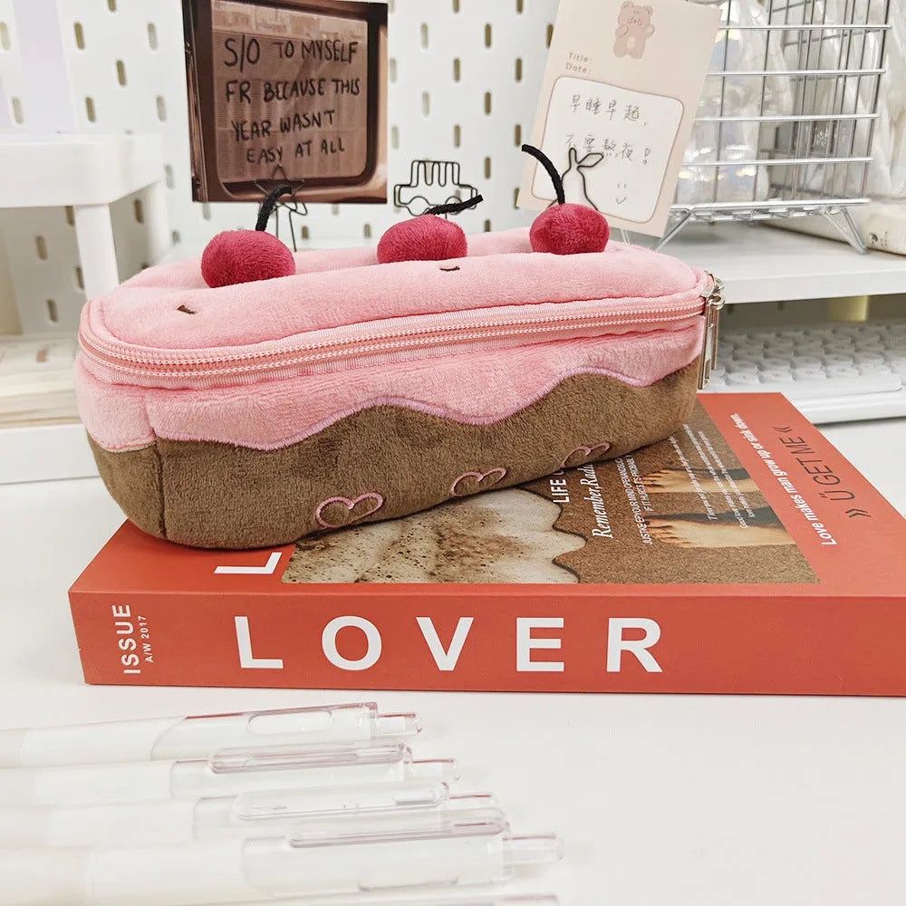 Korean style velvet pencil case with plush cherry cake design on soft fabric pen bag
