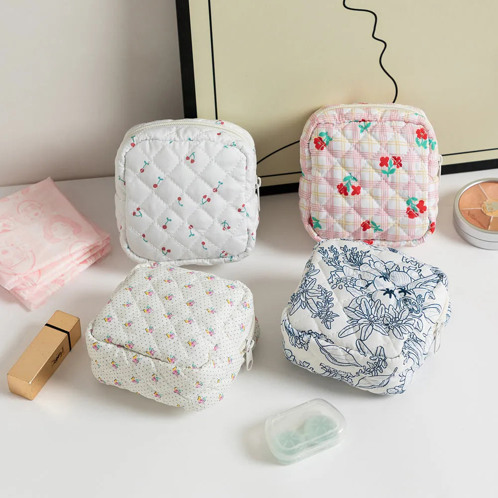 Polyester ladies key storage wallet with floral print and coin purse compartment.