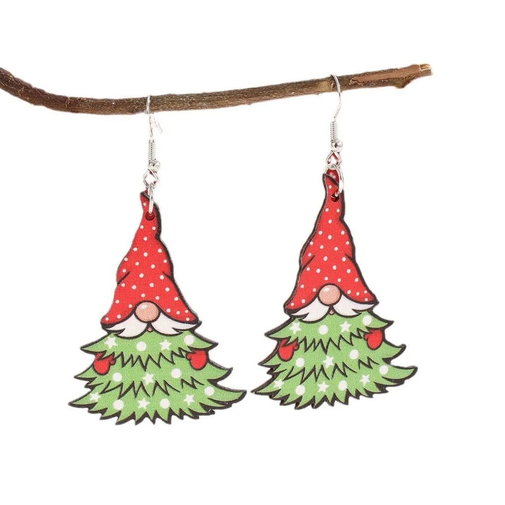 Wooden Christmas earrings with printed tree and snowman designs featuring geometric shapes
