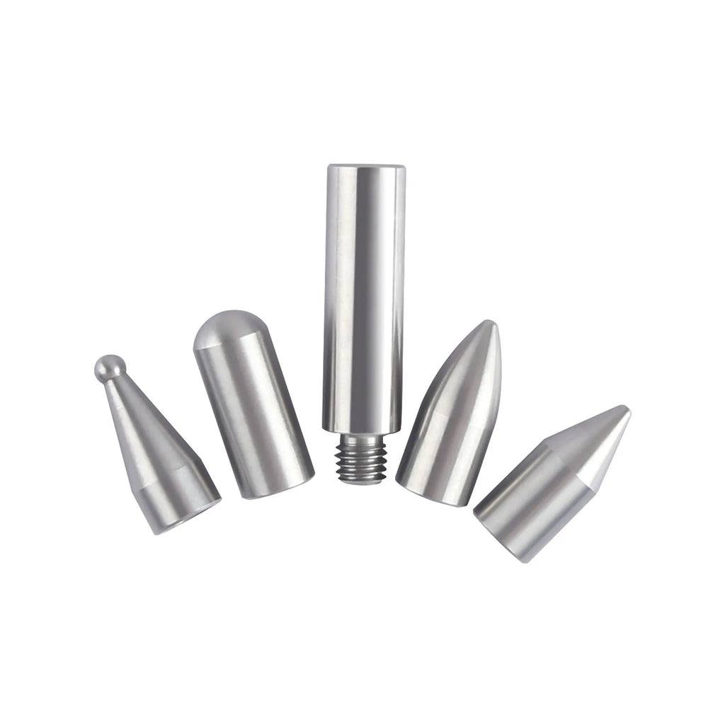 Three alloy steel car dent repair crowbars of different sizes on a workshop surface