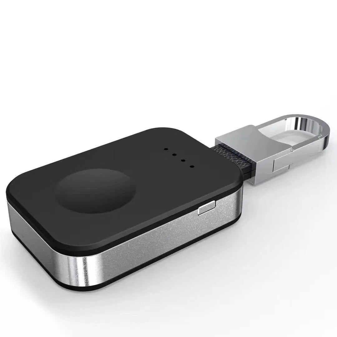 Black Apple Watch magnetic wireless charging power bank on a keyring, showing compact rectangular design.