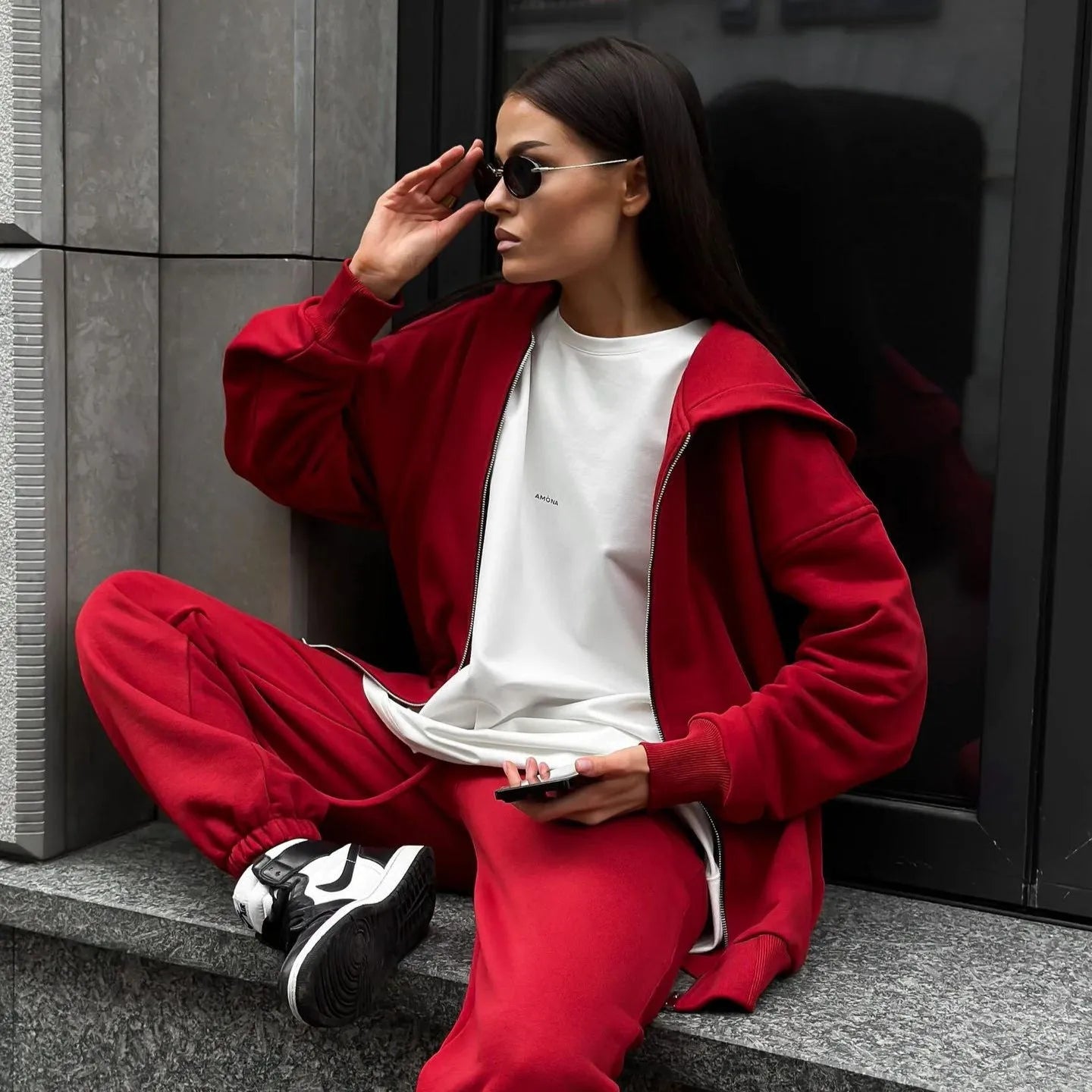 Red loose street style long-sleeved coat and trousers two-piece set on a hanger