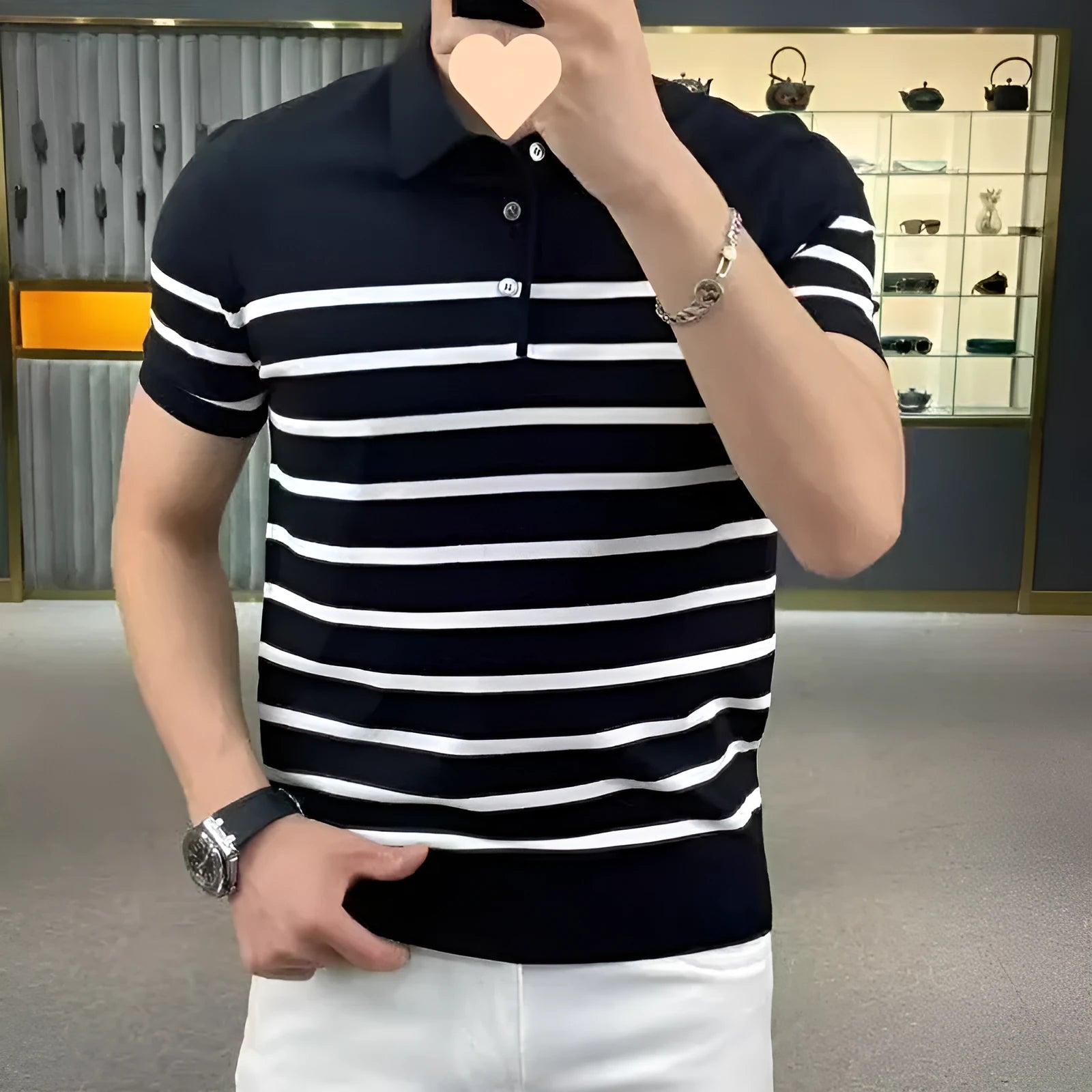 Black and white striped knit t-shirt with lapel collar design showing pullover style