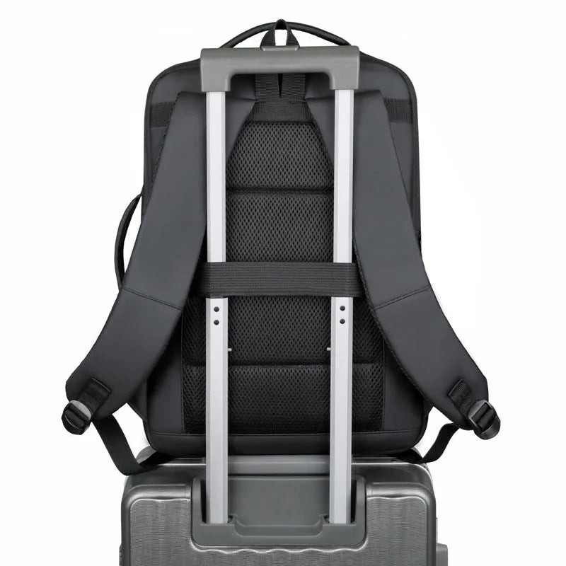 Men's large capacity waterproof backpack in black or grey with curved shoulder strap for business travel