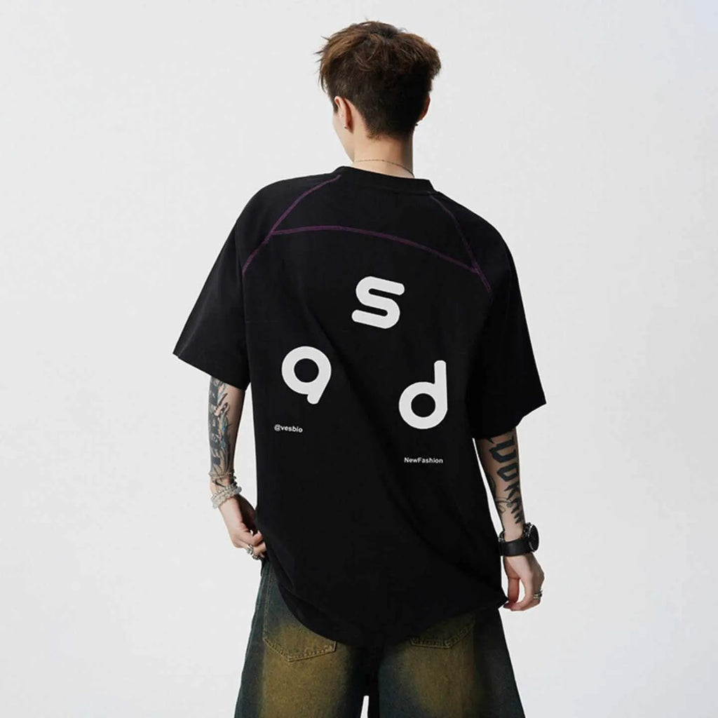 Man's loose fit black cotton T-shirt with large white letter print on the front.
