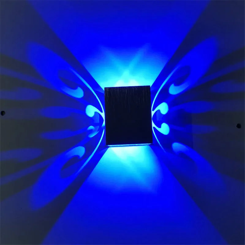 Modern aluminium LED butterfly wall lamp with remote control for seven different light colours.
