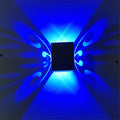 Modern aluminium LED butterfly wall lamp with remote control for seven different light colours.