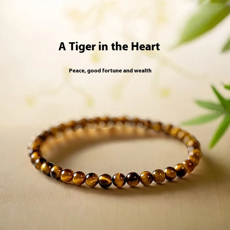 Handcrafted tigereye bracelet in new Chinese style with geometric round elements, shown in 4mm, 6mm, and 8mm bead sizes.