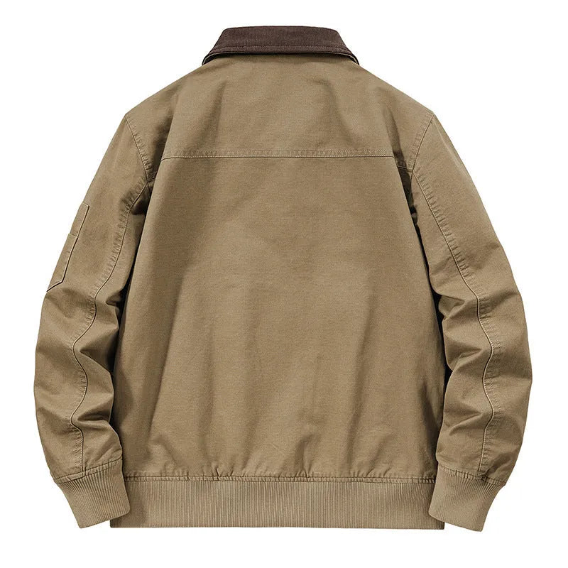 Men's beige washed cotton flight jacket on a hanger, showing its simple design and cotton fabric texture.
